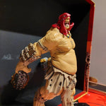 a close up of a statue of a clown