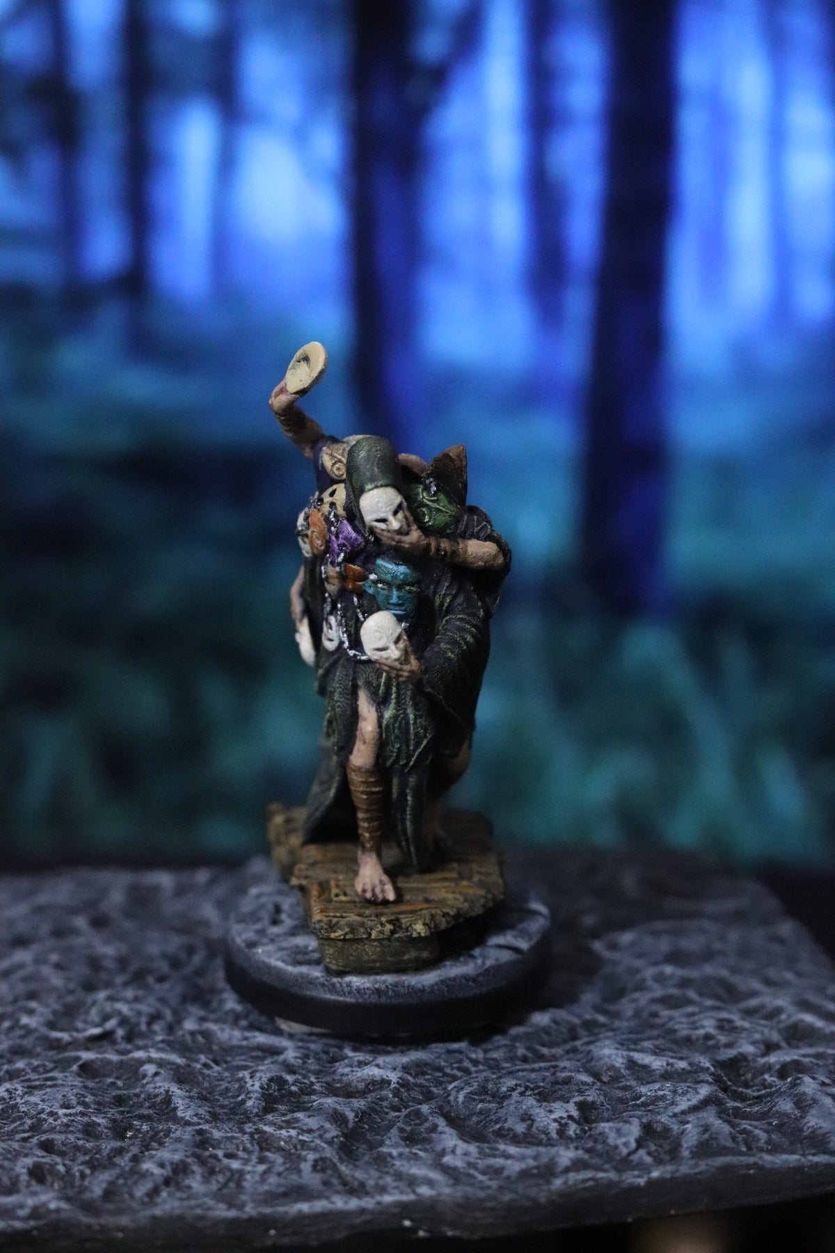 a figurine of a man holding a woman