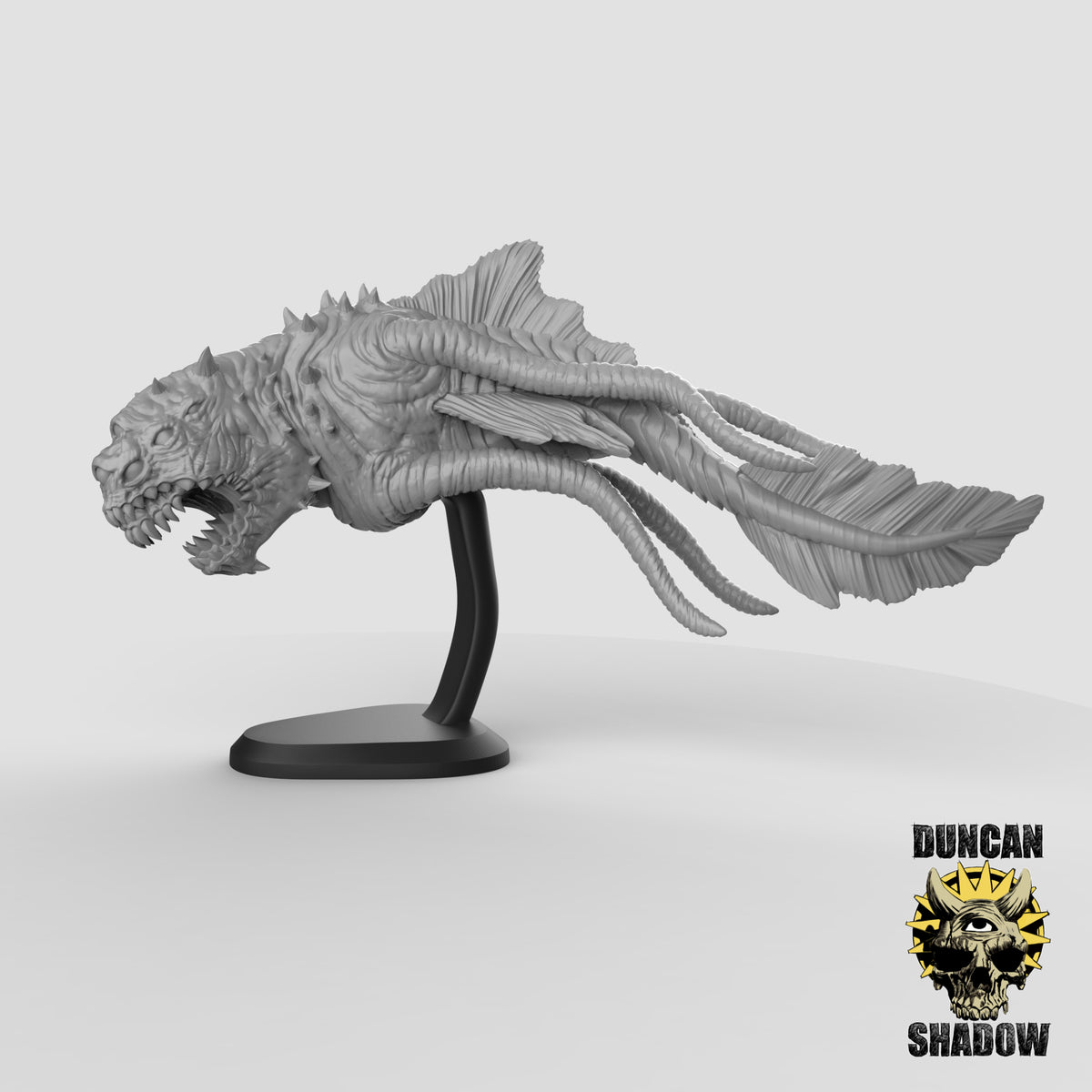 a model of a dragon head on a stand