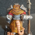 a figurine of a knight holding a sword